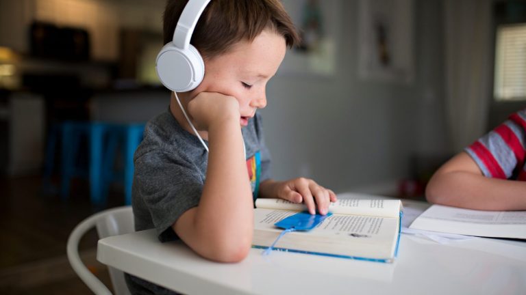 Kid listening to an audiobook